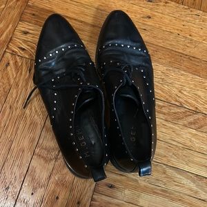 Studded leather oxfords